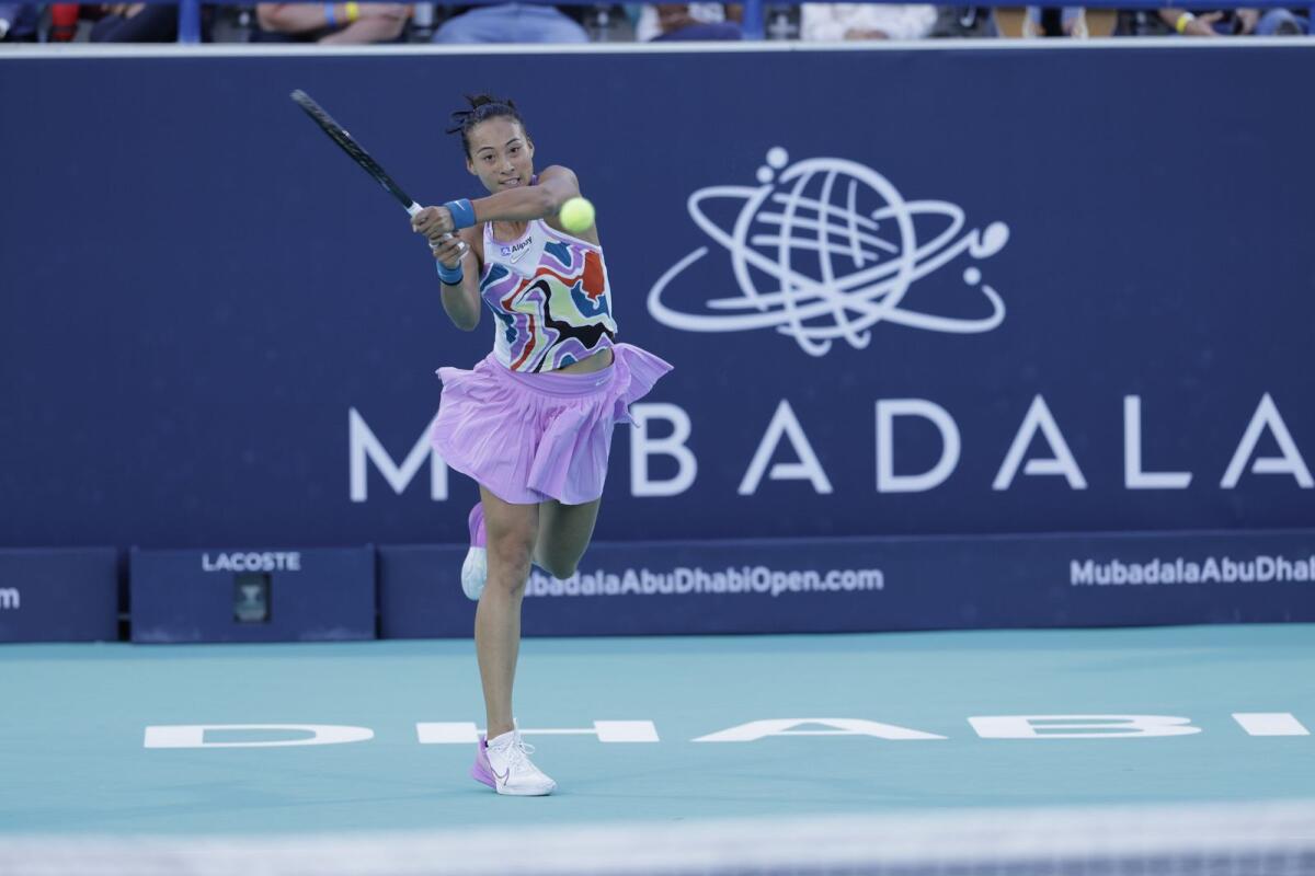 China’s Qinwen Zheng hits a return during her match at the Mubadala Abu Dhabi Open on Sunday. — Supplied photo