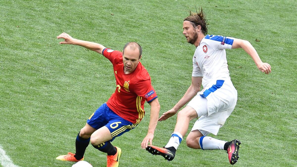 Andres Iniesta pulled the strings for Spain in the midfield as the defending champions earned a hard-fought 1-0 win over a resolute Czech Republic team. This is the first big tournament Iniesta is playing without midfield maestro Xavi.— AFP