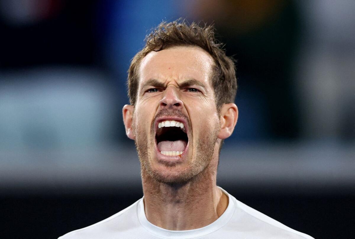 Britain's Andy Murray celebrates after winning his second round match against Australia's Thanasi Kokkinakis. — Reuters