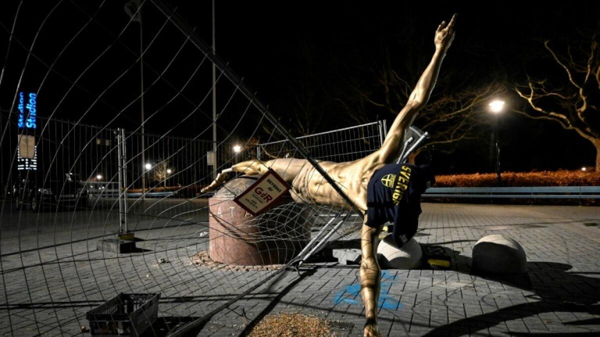 FOUL PLAY: The statue of Ibrahimovic pictured after it was destroyed in January. - AFP file