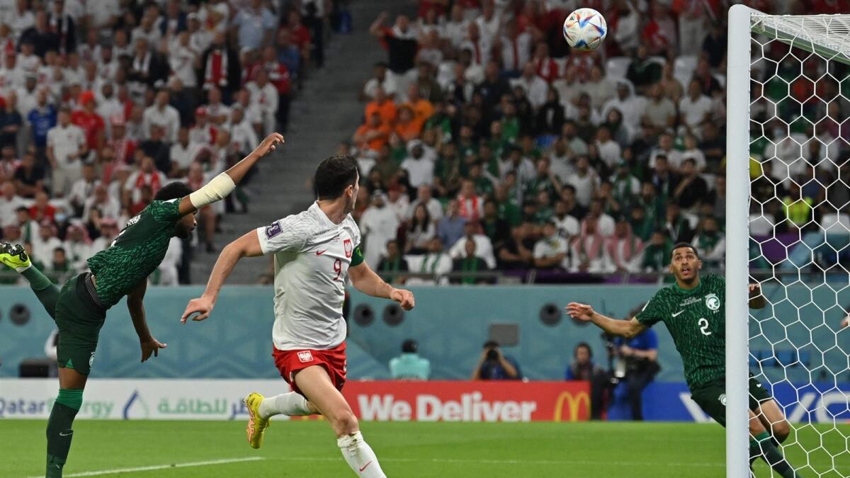 Poland's forward Robert Lewandowski eyes the ball after an attempt on goal in a Group C match against Saudi Arabia at the Fifa World Cup on Saturday. Poland won 2-0. Photo AFP.