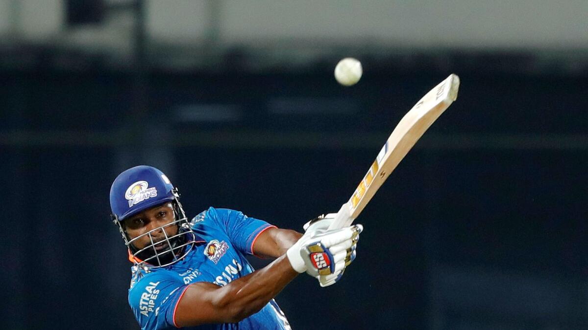 Kieron Pollard of Mumbai Indians hitting a boundary during the IPL match against Chennai Super Kings. — PTI
