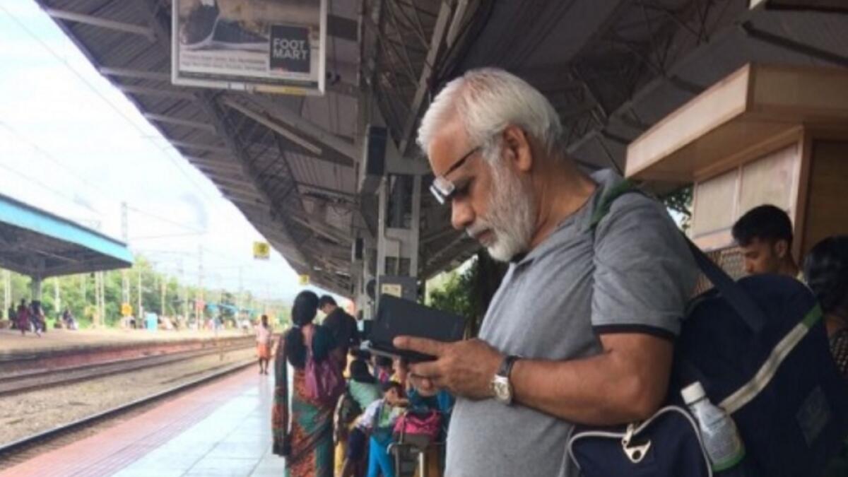 Peeved by offending photo, Modi lookalike to shave off beard