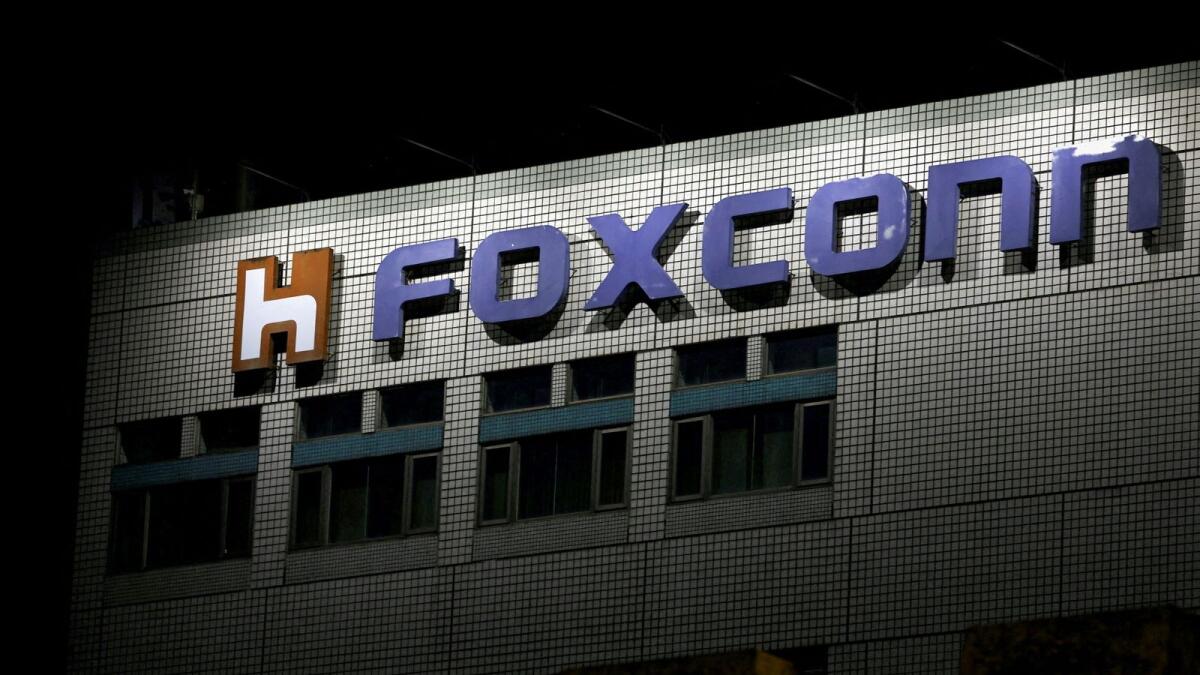 The logo of Foxconn is seen outside the company's building in Taipei.  - Reuters
