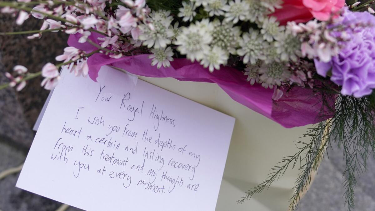Flowers and a letter to the Princess of Wales were left outside Windsor Castle in Windsor, England. — AP