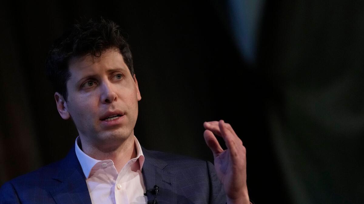 OpenAI's CEO Sam Altman gestures while speaking at University College London as part of his world tour of speaking engagements in London, on May 24,. — AP