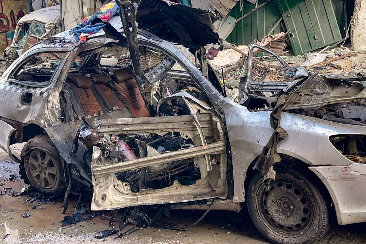 The car in which 3 sons of Hamas leader Ismail Haniyeh were reportedly killed in an Israeli air strike. Photo: AFP