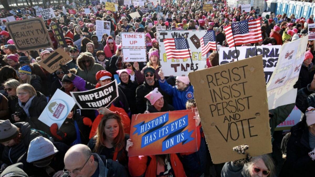 Trump inauguration anniversary marred by shutdown, protests