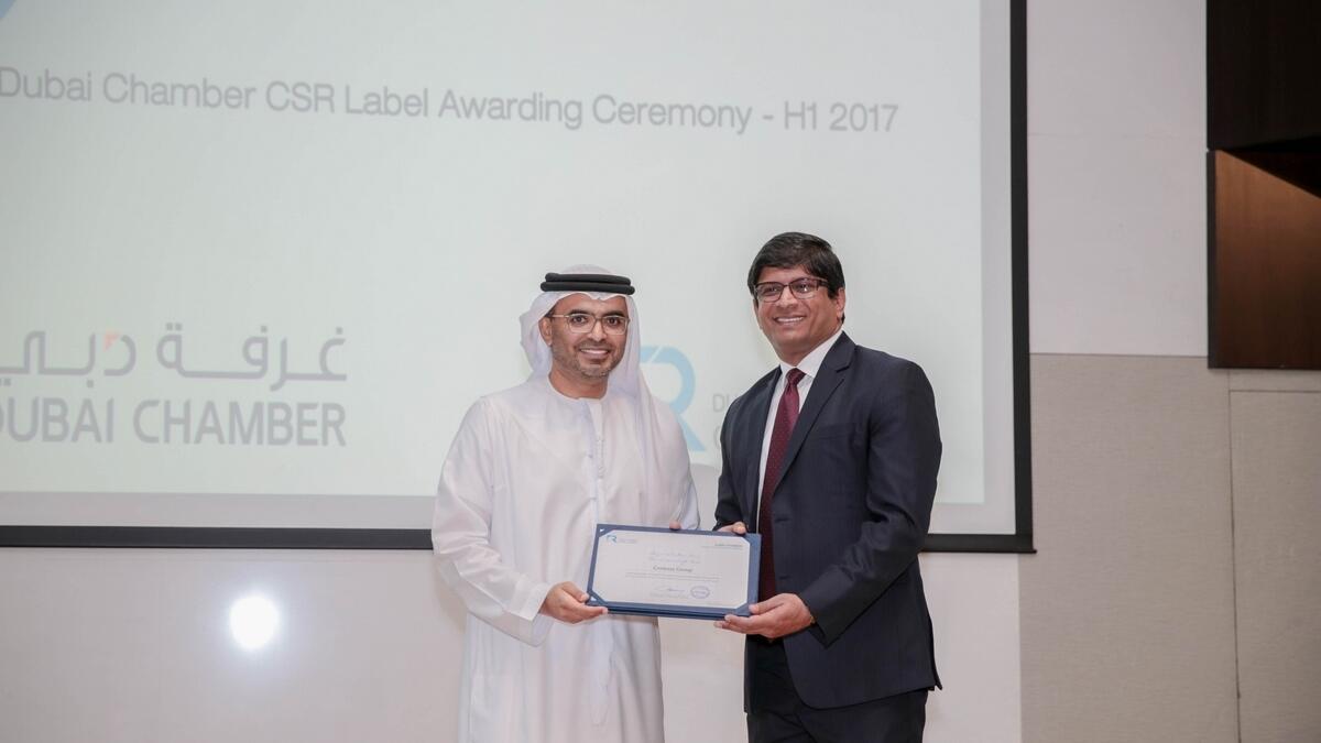 Sanjay Raghunath, Centena Groups Chairman and Managing Director, receiving the award from Majid Saif Al Ghurair, Chairman of Dubai Chamber of Commerce and Industry.