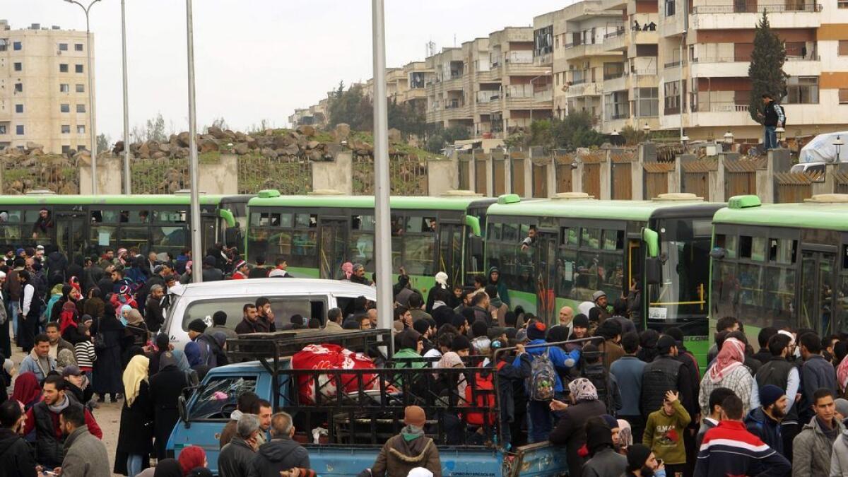 Syrian rebels resume withdrawal from last Homs bastion