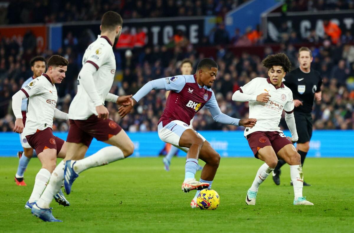 Aston Villa's Leon Bailey in action with Manchester City's Rico Lewis.Bailey scored the only goal of the match on Wednesday. - Reuters