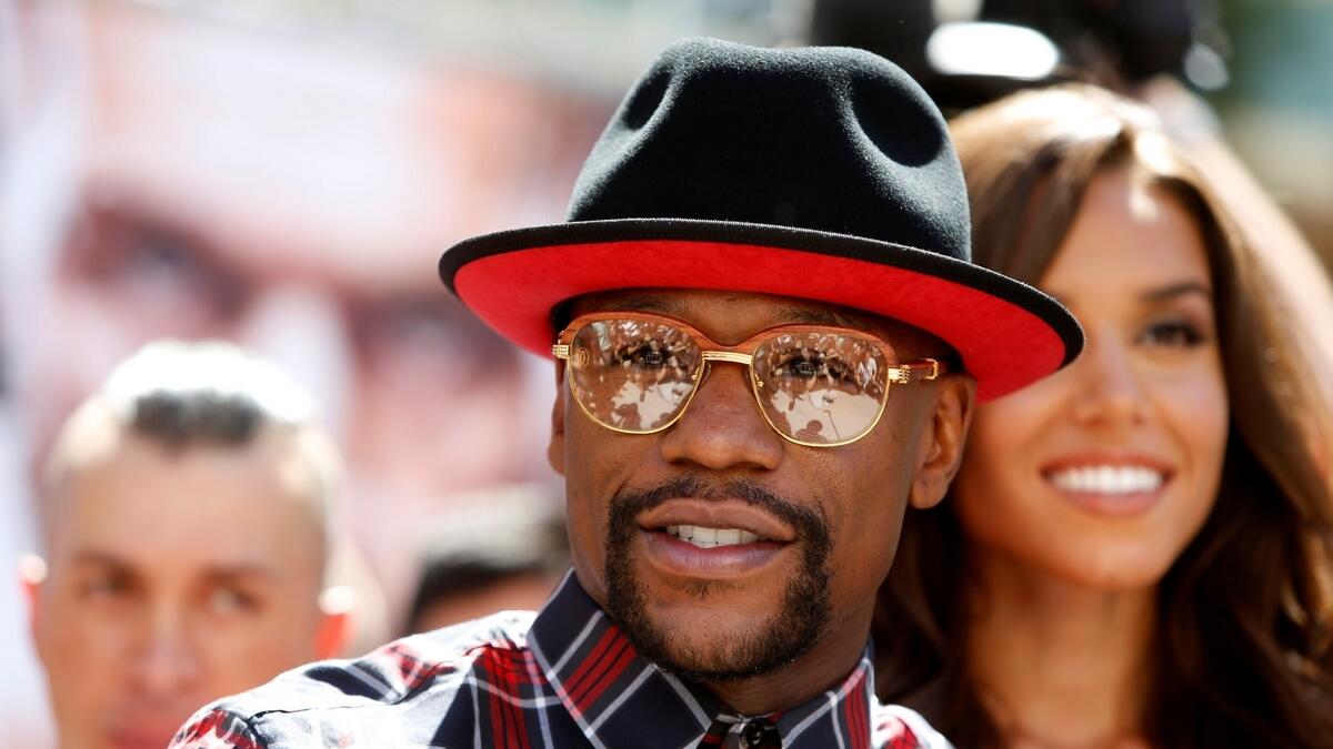 Undefeated and unloved, Mayweather eyes final payday