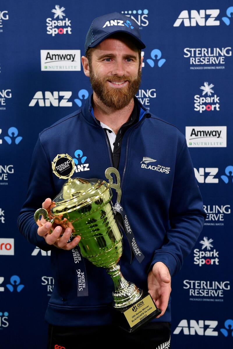 New Zealand's Kane Williamson holds the series trophy. — AFP