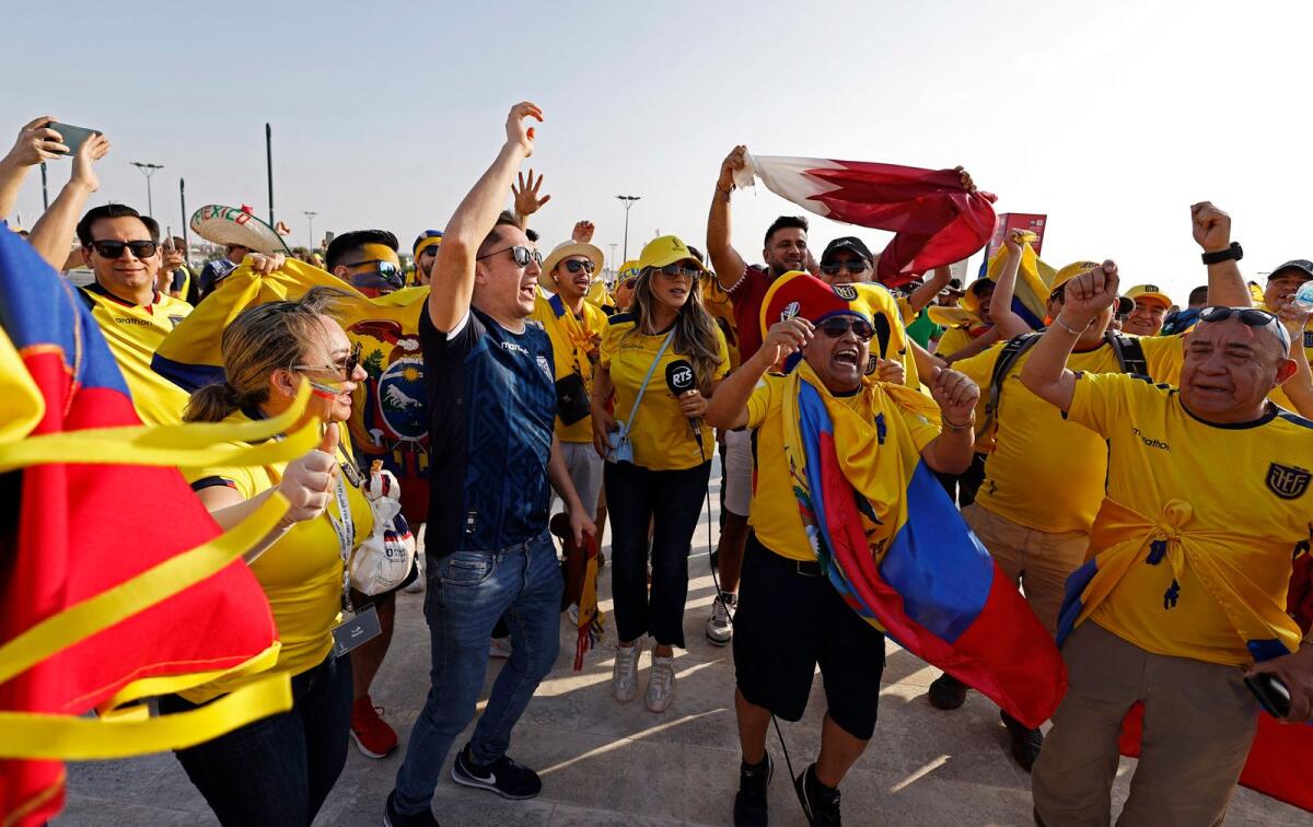 Ecuador fans outside the stadium before the match. Photo: Reuters