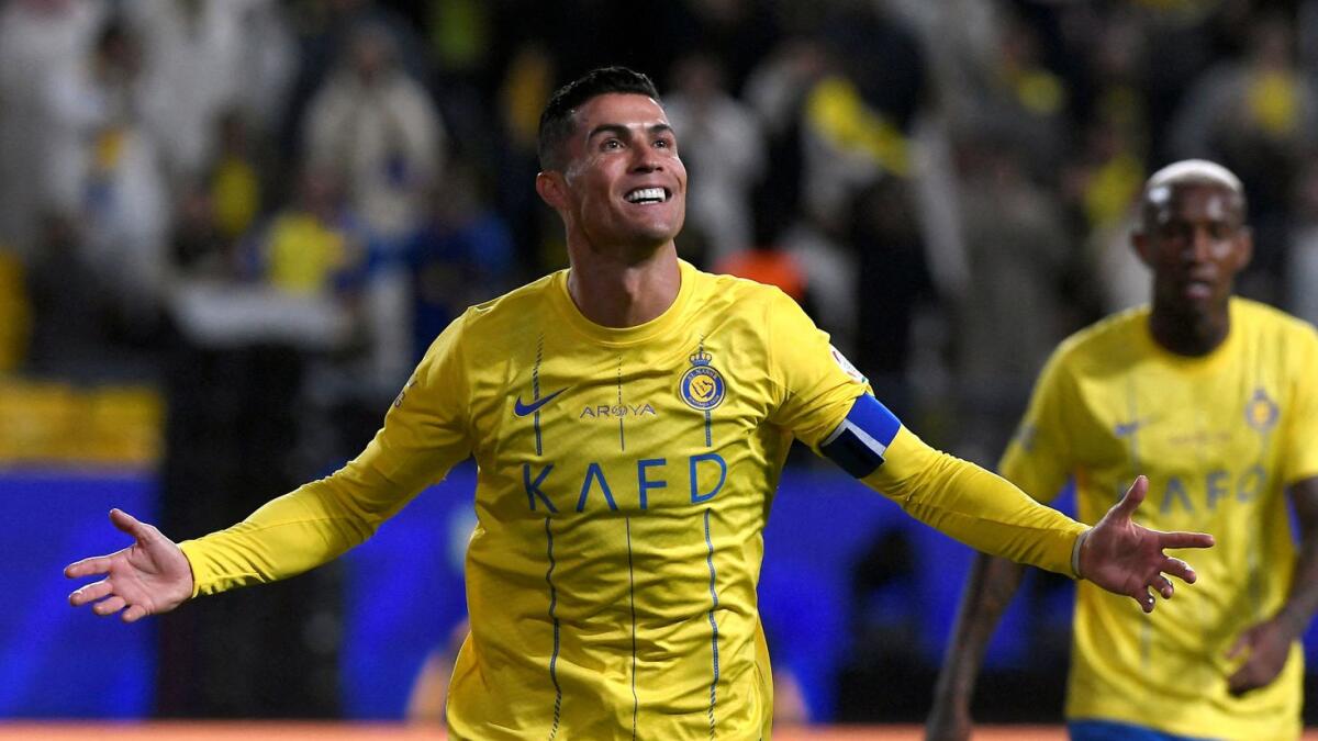 Al Nassr's Cristiano Ronaldo celebrates scoring their first goal. - Reuters
