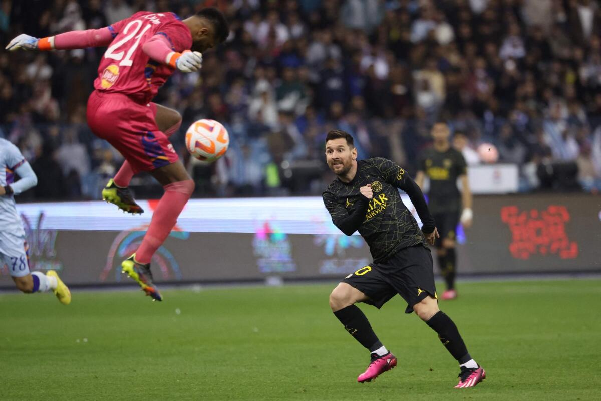 Paris Saint-Germain's Argentine forward Lionel Messi shoots during the match. — AFP
