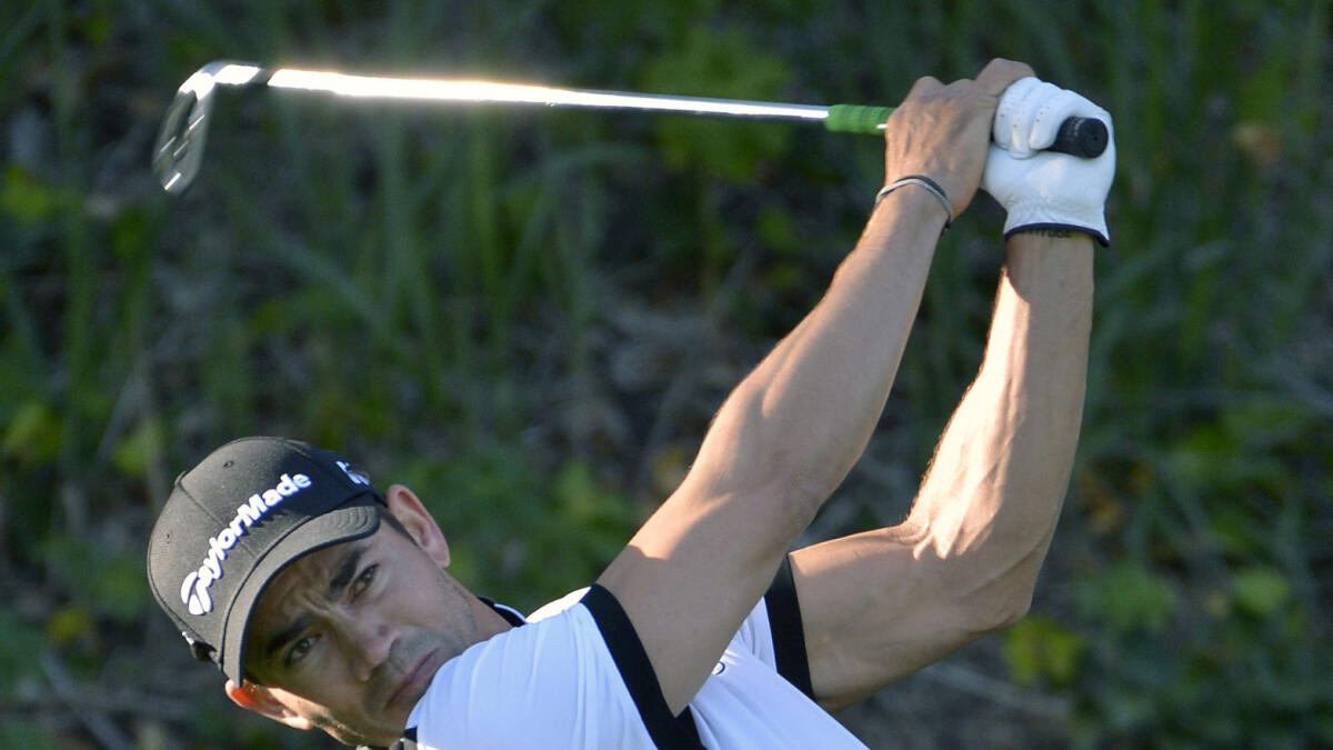 Camilo Villegas tees off on the sixth hole during the first round of the Northern Trust Open golf tournament. — AP