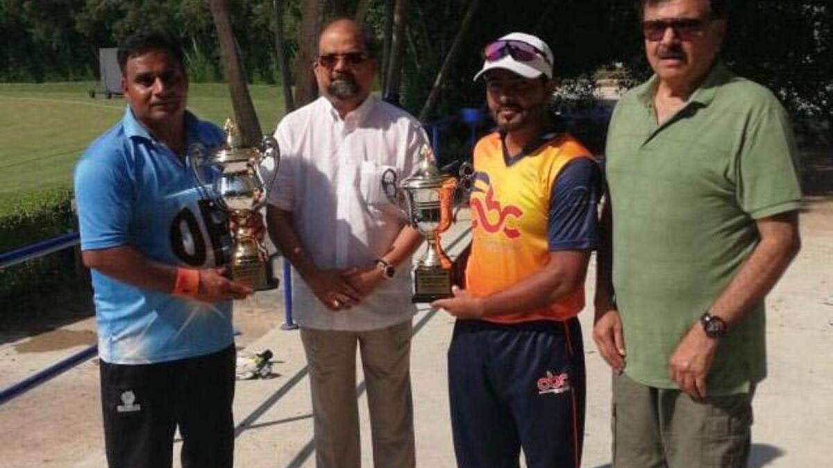 Venu Gopal of Oasis Chemicals Sharjah with the captains and organiser Tariq Butt. (Supplied photo)