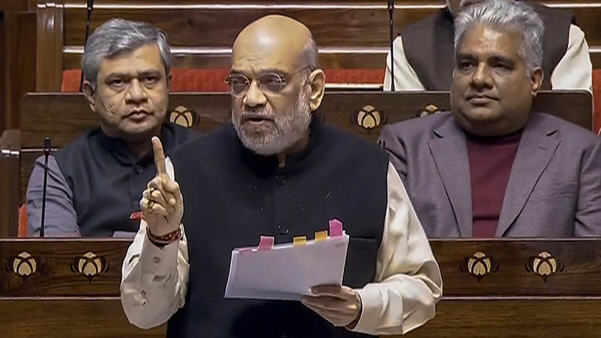 Indian Home Minister Amit Shah Amit Shah speaks in the Rajya Sabha during the Winter session of Parliament in New Delhi on Thursday. Photo: PTI