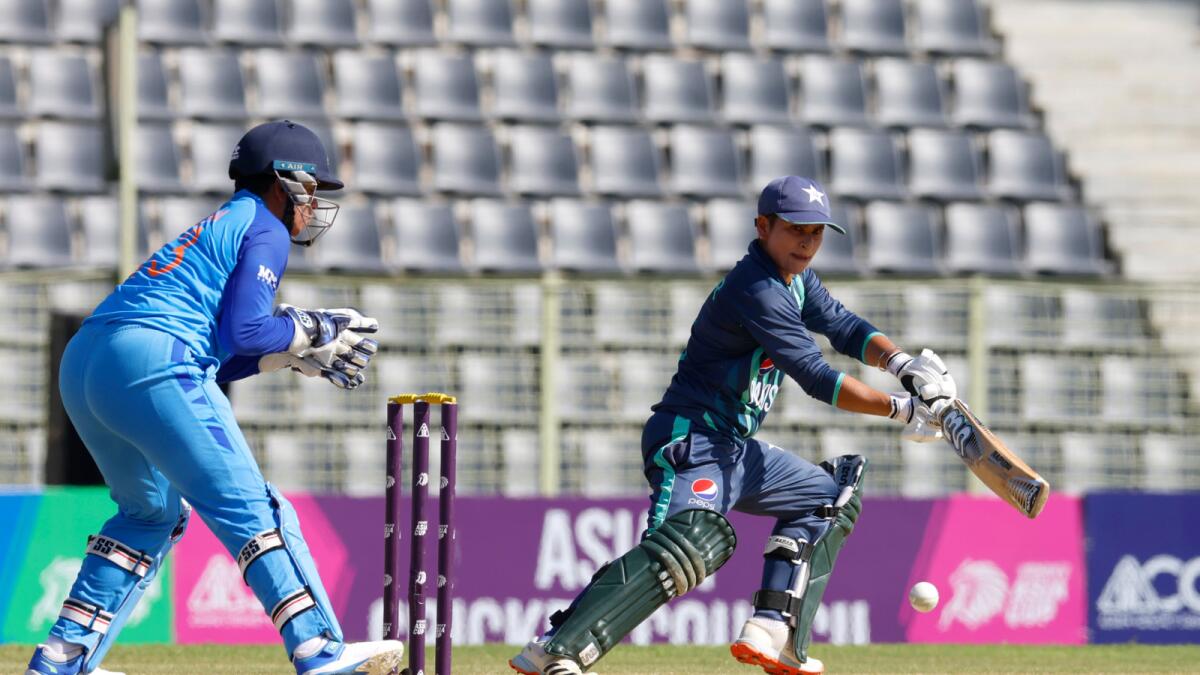 Pakistan's Nida Dar (right) plays a shot against India on Friday. — PCB