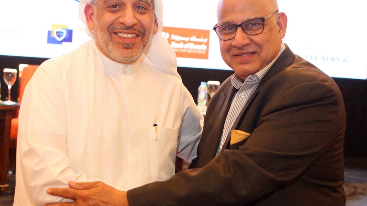 Mishal Kanoo, chairman of KAAF Investments, and Suresh Kumar, chairman of the IBPC, at a leadership summit organised by Accounting, Audit &amp; Advisory Services Focus Group in Dubai.