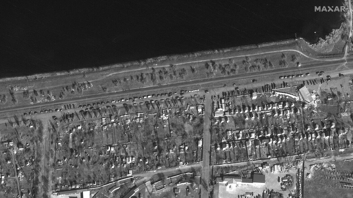 This Maxar satellite image taken and released on February 26, 2022, shows an overview of additional Russian ground forces as they approach Nova Kakhovka, Ukraine. Photo: AFP