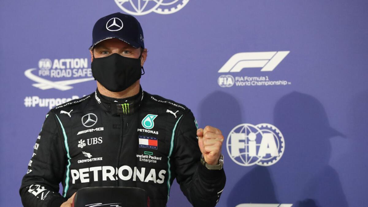 Mercedes' Valtteri Bottas celebrates after qualifying in pole position for the Sakhir Grand Prix on Saturday. — Reuters