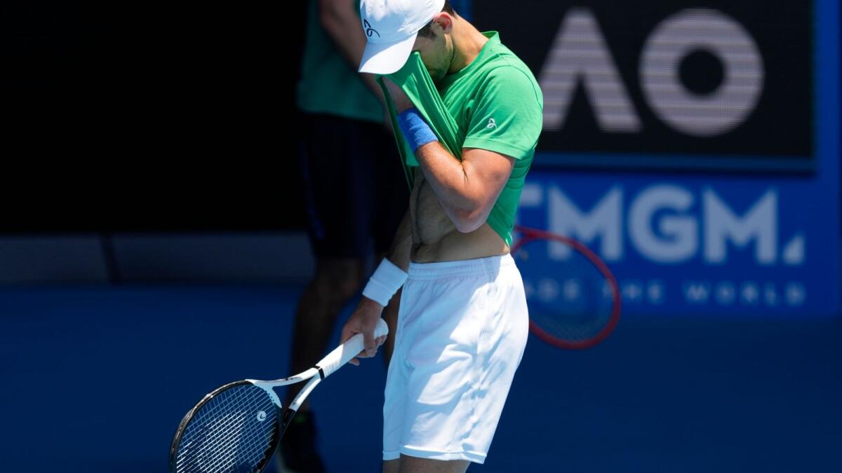 Defending men's champion Serbia's Novak Djokovic practices in Melbourne on Thursday. — AP