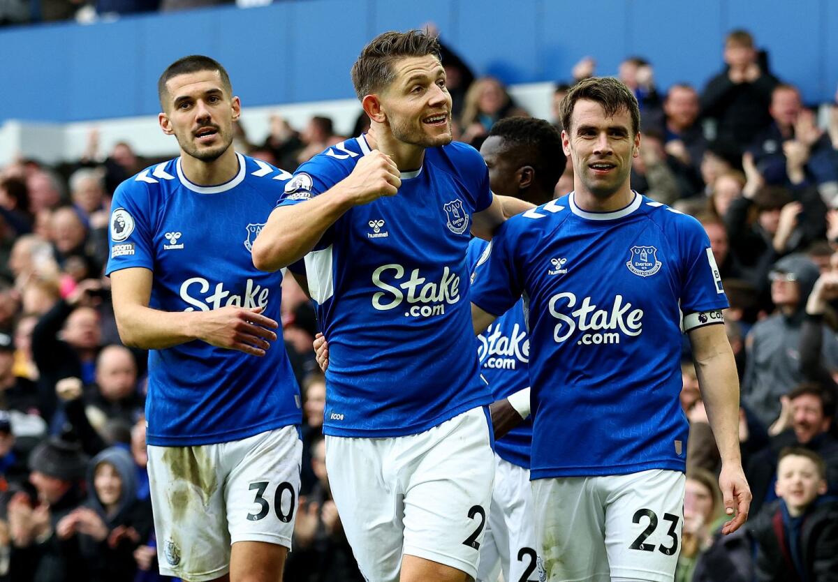 Everton's James Tarkowski (centre) celebrates scoring against Arsenal on Saturday. — Reuters