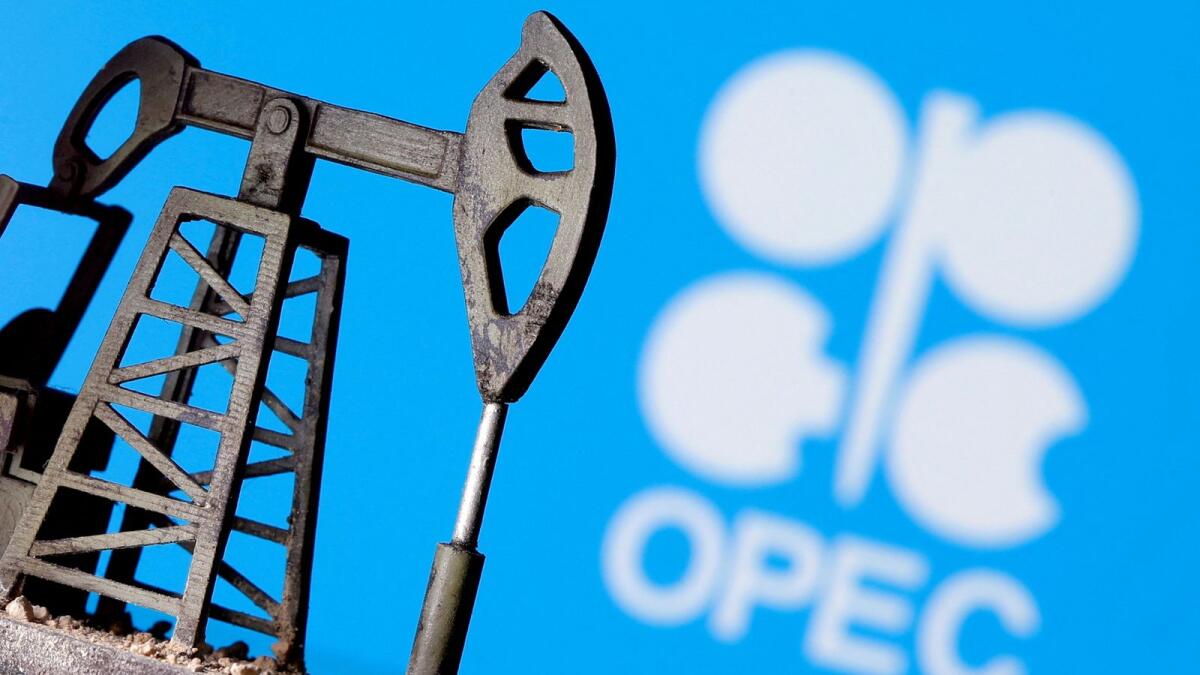 A 3D-printed oil pump jack is seen in front of displayed Opec logo in this illustration picture,. — Reuters