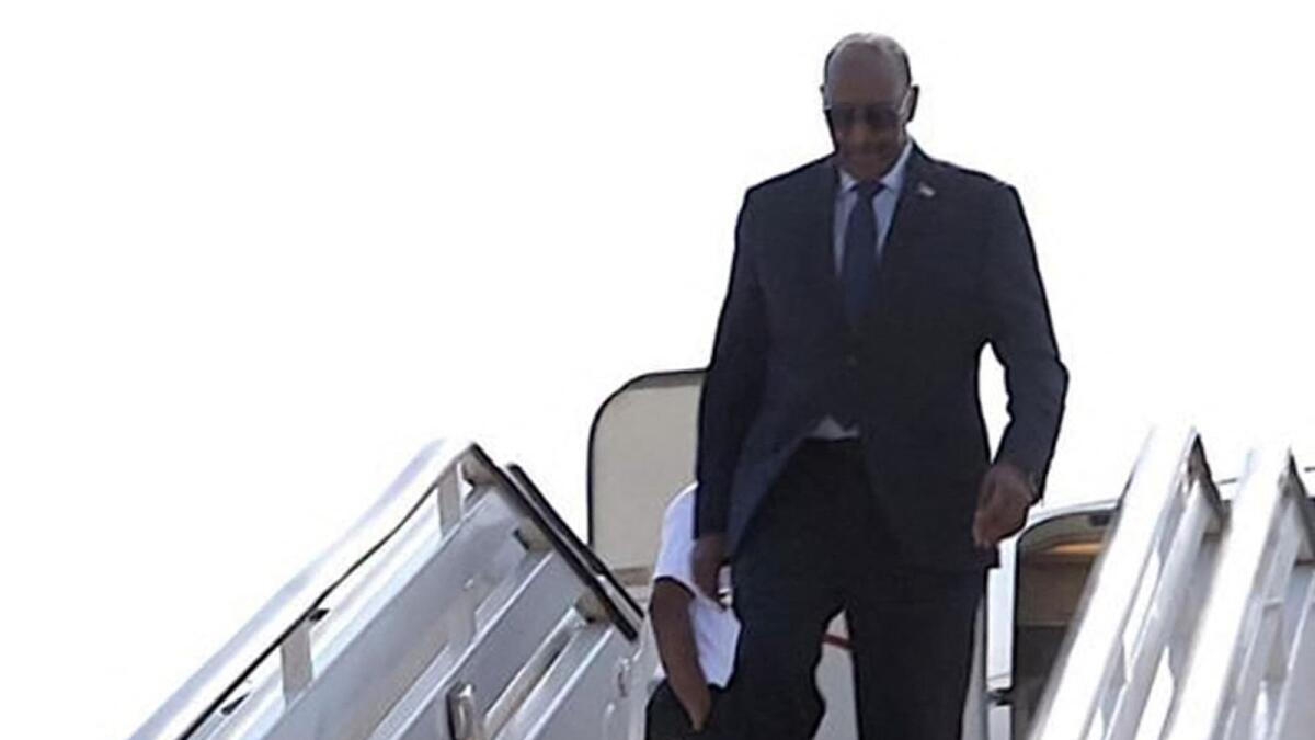 Sudan's army chief General Abdel Fattah Al Burhan disembarking from an aircraft in Port Sudan. — AFP file