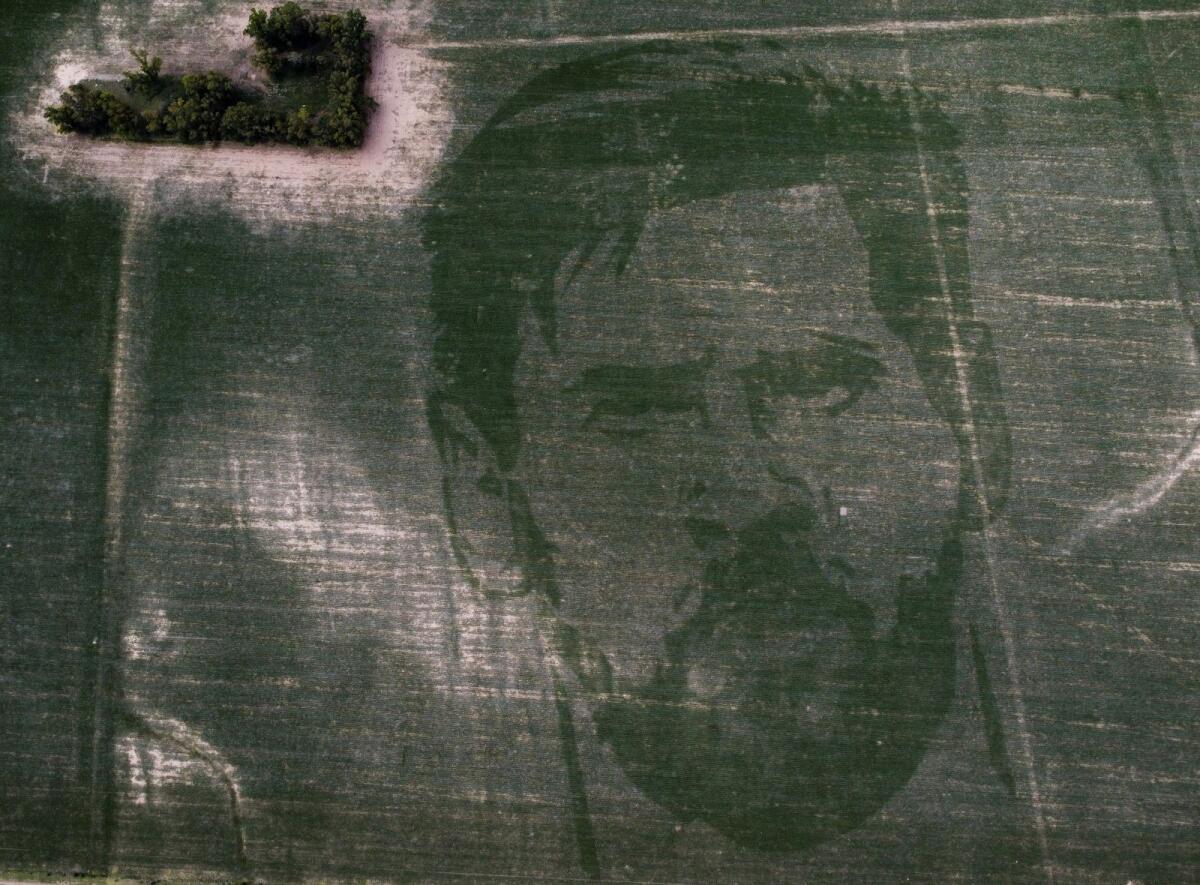 The face of Argentine football star Lionel Messi is depicted in a corn field on the outskirts of Cordoba, Argentina. — Reuters