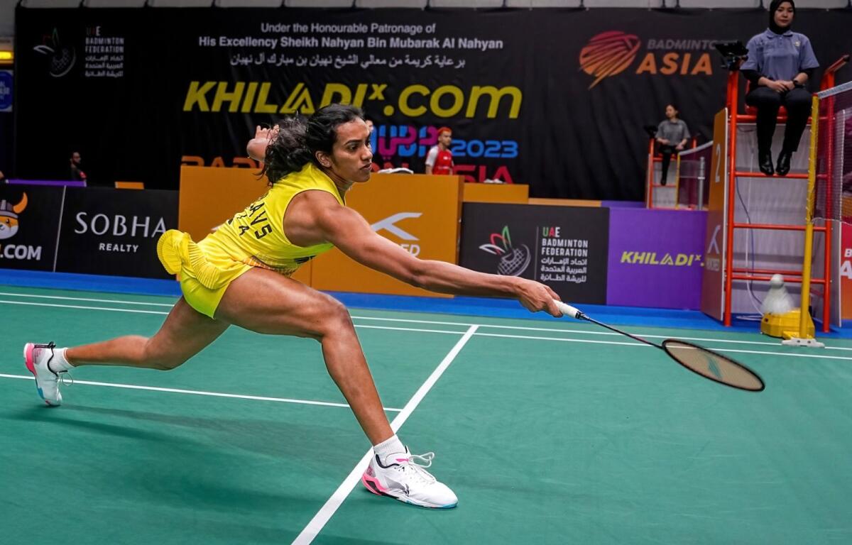 PV Sindhu hits a return during her opening match on Wednesday. — UAE Badminton Federation