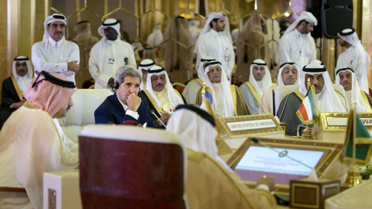 US Secretary of State John Kerry, GCC Secretary-General Abdullatif bin Rashid Al Zayani of Bahrain (2R) and Kuwait's Foreign Minister Shaikh Sabah Khalid Al Hamad Al Sabah (R) listen while Oman's Foreign Minister Yusuf bin Alawi (L) speaks during a meeting of foreign ministers of the GCC in Doha, Qatar.