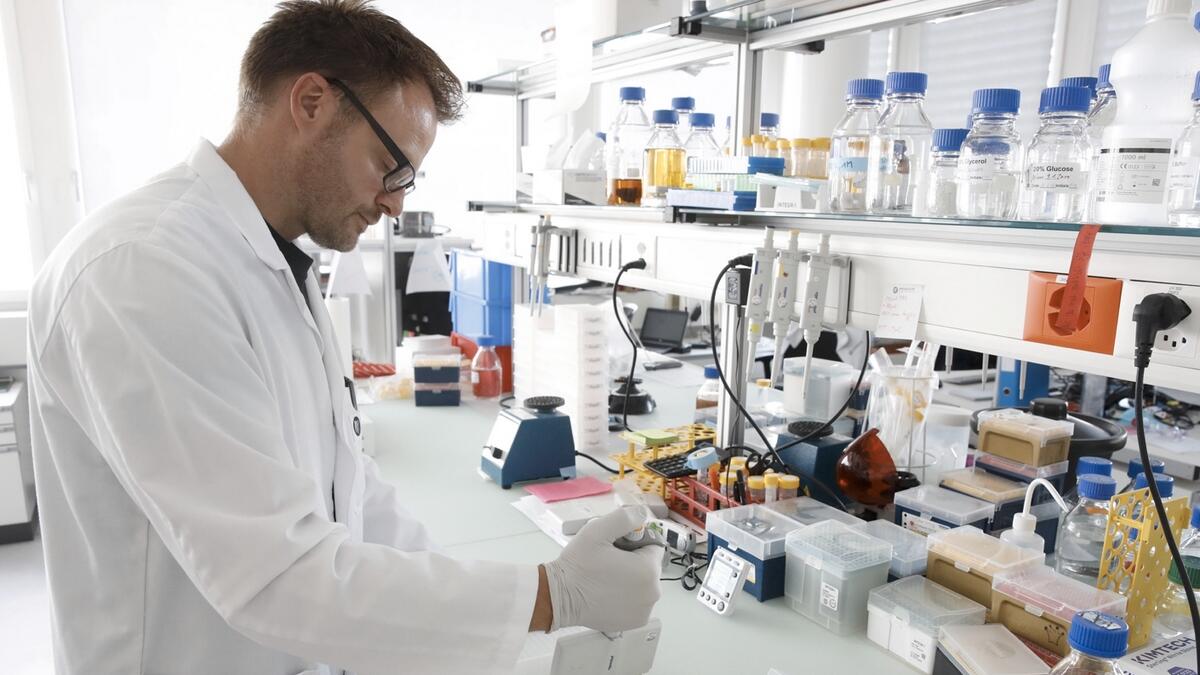 Marcel Walser, Director Lead Generation of Swiss biotechnology company Molecular Partners works in a laboratory at the company's headquarters in Schlieren, Switzerland. Photo: Reuters