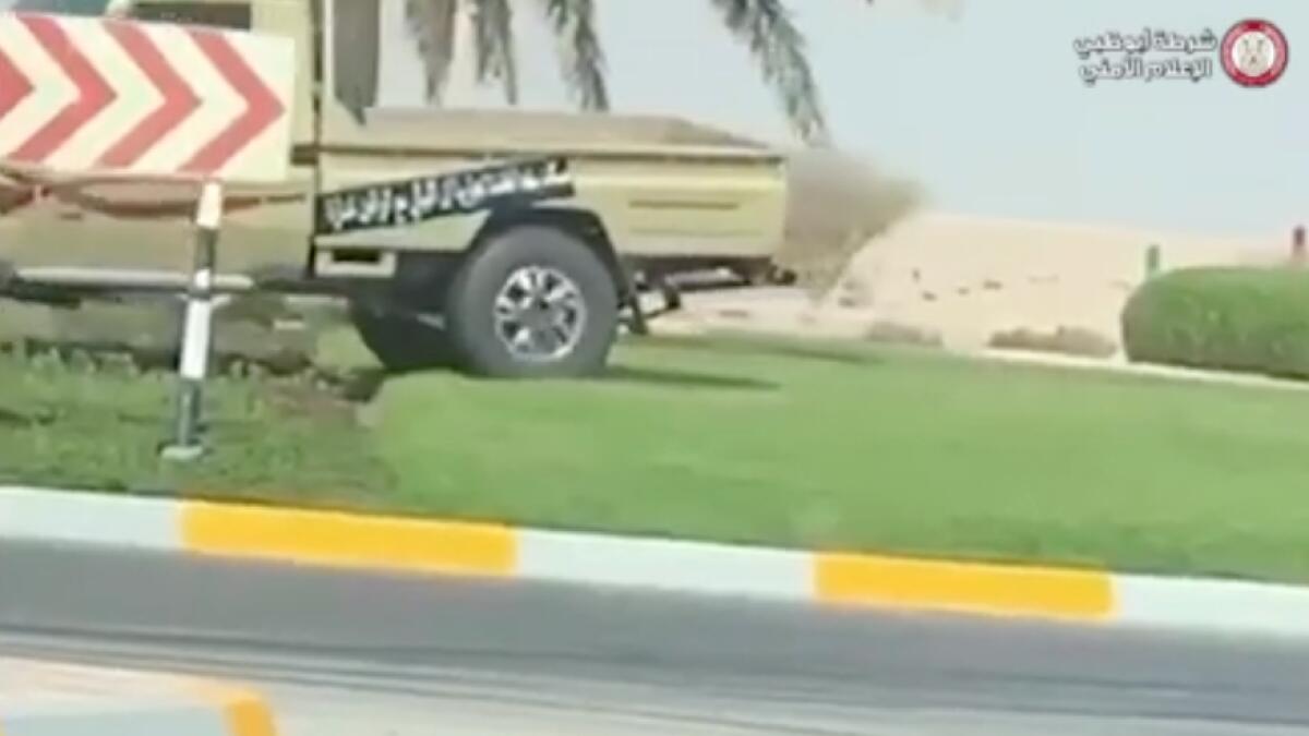 Abu Dhabi police, community service, roundabout