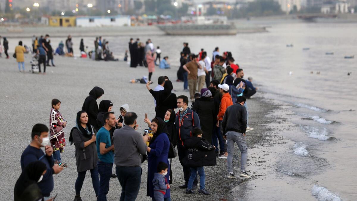 Iranian people gather at a promenade, amid a rise in the coronavirus disease (COVID-19) infections, West Tehran, Iran October 23, 2020.