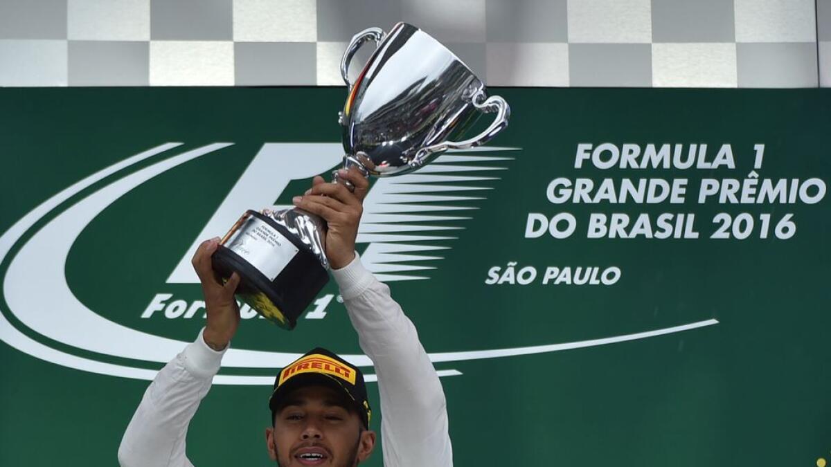 Hamilton wins rain-hit Brazilian GP