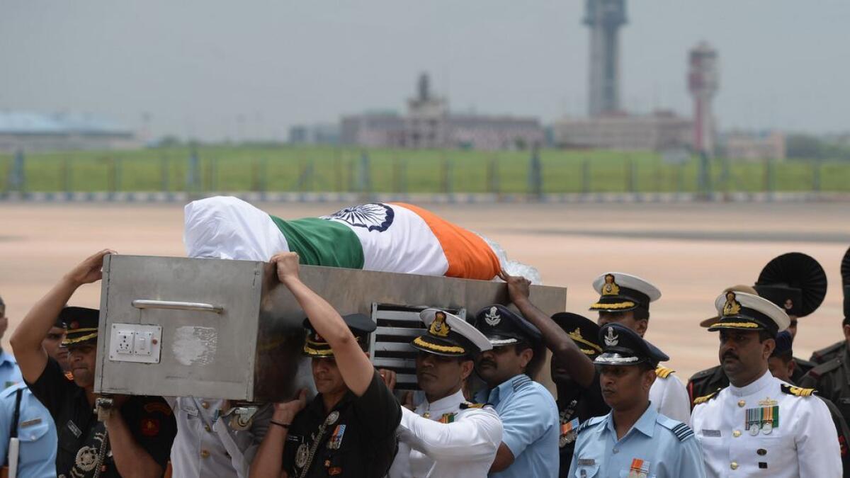 Members of the military staff carry the coffin of former Indian President APJ Abdul Kalam. 