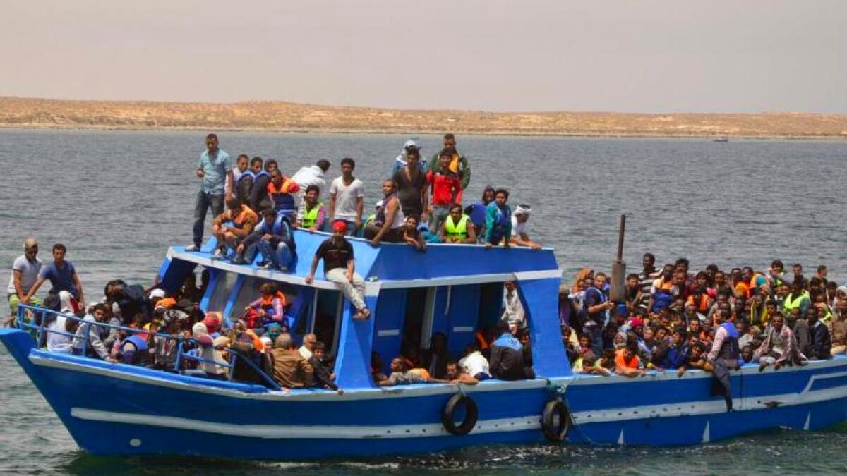 Illegal migrants are seen on a boat after being rescued by the Tunisian navy off the coast near Ben Guerdane, Tunisia. File photograph is used for illustrative purpose only
