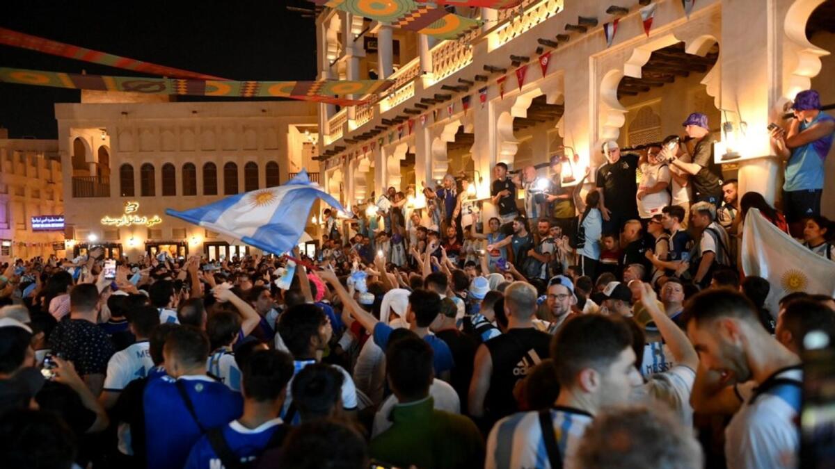 Argentina fans sing at Souq Waqif in Doha. AFP