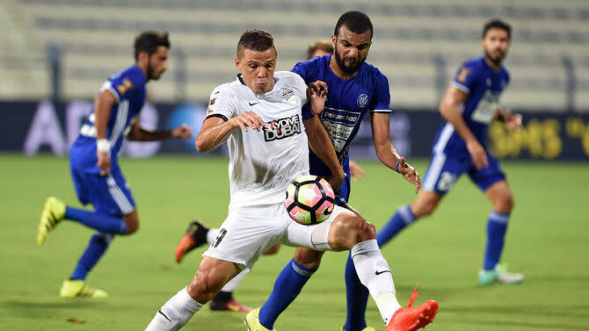 Al Nasr forward Wanderley Santos in action
