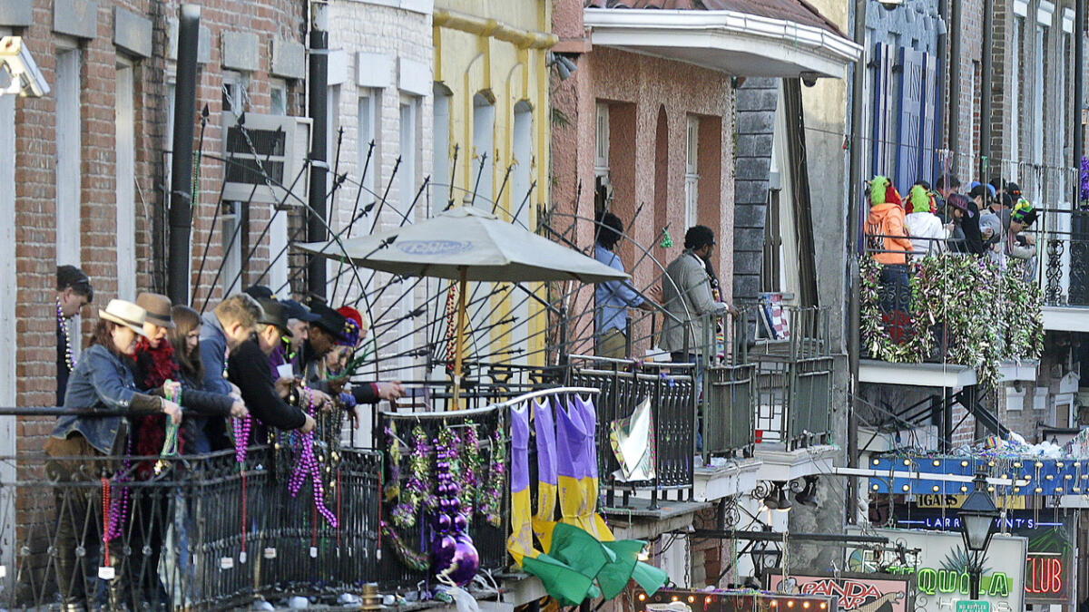 Revellers pack Bourbon Street on Mardi Gras day in the French Quarter in New Orleans.