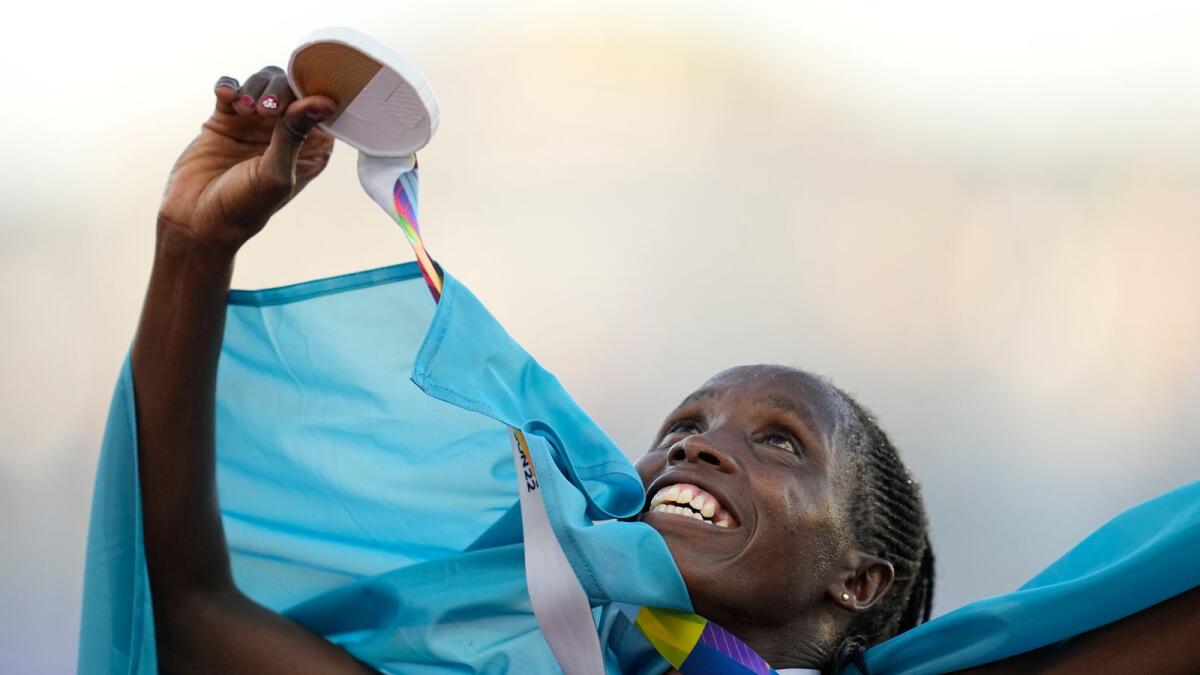 Gold medalist Norah Jeruto of Kazakhstan celebrates after winning the women's 3000m  steeplechase final at the World Athletics Championships. — AP