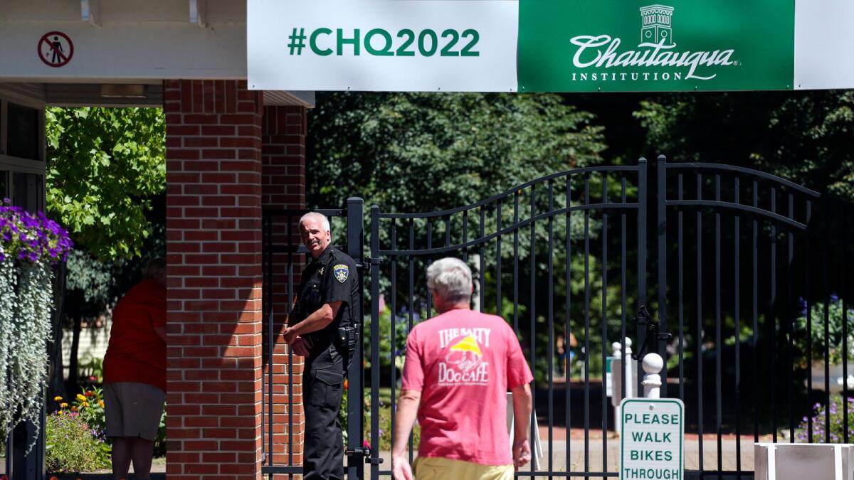 An officer stands outside a gate of the Chautauqua Institution in Chautauqua, New York.  – AP
