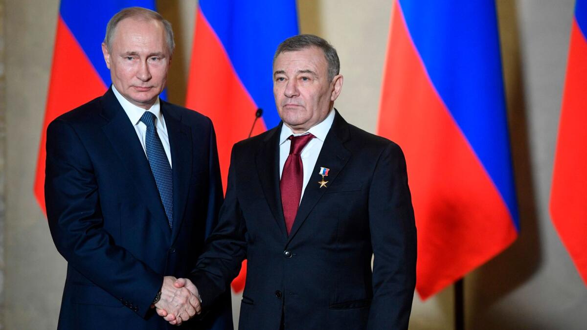 Russian President Vladimir Putin and businessman Arkady Rotenberg.