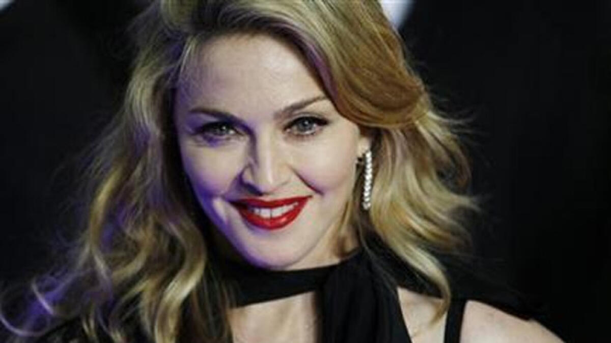 Madonna brings star power, children to new video