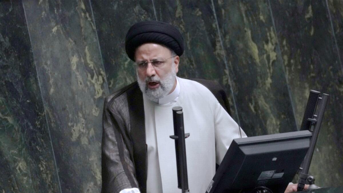 Iranian President Ebrahim Raisi addresses the parliament. — AP