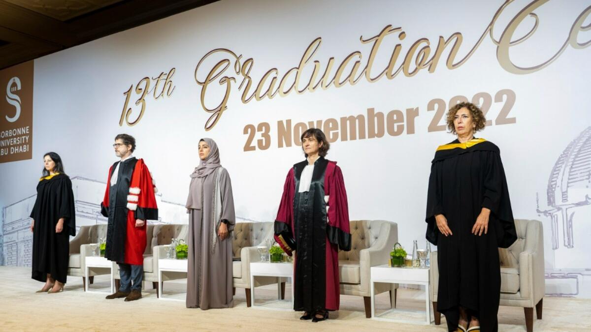 Reem Al Hashimy with university officials at a graduation ceremony at the Sorbonne University in Abu Dhabi.