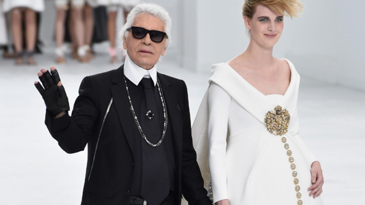 While in 2014, Karl Lagerfeld designed an entire Chanel show around seven-month pregnant Ashleigh Good, who wore a flowing white gown over her bump.